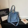 Shuai Mijia 2026 Nova Bolsa de Motocicleta Retrô Resistente Grande Capacidade Casual Jeans Lavado Bolsa de Ombro Transversal