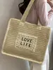 2026 Nuevo Estilo Bolso de Paja Color Sólido Tejido con Letras Personalizadas Bolso de Hombro Tote de Gran Capacidad Casual para Vacaciones Estilo Pastoral