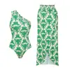 Traje de baño de alta gama nuevo europeo y americano, traje de baño de una pieza verde estampado de un solo hombro, traje adelgazante para mujeres de talla grande, producto popular transfronterizo