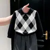 Ropa infantil coreana 2026 colección de otoño nueva: suéter clásico negro con patrón de rombos y cuello, y pantalón de traje gris recto para niños