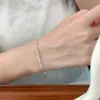 Pulsera tejida a mano de plata de ley S925 con cuentas redondas de cristal blanco y nudo de bambú, Pulsera de diseño de nicho de lujo ligero de moda