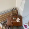 Mochila Feminina de Alta Qualidade 2025 Nova Mochila para Deslocamento Bolsa Escolar para Estudante Universitário Bolsa Tote Transversal de Ombro Único