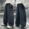 Pantalones holgados de pierna ancha para niño color gris casual largos nuevo estilo 2026 para niños medianos y grandes marca moderna pantalones de trabajo estilo primavera y otoño