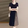 Vestido de verano a la moda para madres, vestido de cuello redondo y manga corta, vestido irregular de longitud media elegante y con estilo para mujeres de mediana edad de 50 años