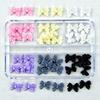 Transfronterizo 6 cajas resina de uñas lazo cinta mezcla multicolor estéreo esmerilado pajarita taladro accesorios diy