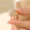 Amazon Venta Caliente Transfronteriza Collar Anillo Giratorio Incrustado de Diamantes Trébol de Cuatro Hojas Anillo Abierto Ajustable Venta al por Mayor desde el Fabricante