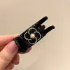 Pinza de pelo pequeña con garra para temperamento de princesa, pinza de pelo lateral estilo coreano exquisita, sensación de alta gama, nuevo pinza de pelo para media coleta 2026