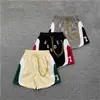 2026 Nuevos Shorts de Lana Bordados con Letras Grandes Estilo Retro Americano de Cinco Puntas para Hombre, Pareja, Europeos y Americanos