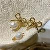 181/00 Aretes tejidos de lazo para niña estilo francés con perlas de agua dulce zhen 2 usando pendientes cortos simples retro B1/6