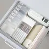 Caja de almacenamiento de cables de datos blanca caja de cables de rejilla de escritorio hebilla organizadora de cable de carga de teléfono móvil artefacto de recolección de cables de alimentación computadora