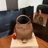 Bolso Cubo Versátil de Nicho Súper Popular Estilo Coreano 2026 Nuevo Bolso de Hombro Cruzado de Moda Casual para el Trabajo