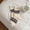 Nuevos calcetines apilados de longitud media de tendencia étnica de doble estilo vintage para otoño e invierno al por mayor, calcetines originales únicos para mujer
