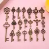 Chave de coração dourada KC vintage transfronteiriça, pingente de chave de trevo de quatro folhas em liga, acessórios de joias DIY feitos à mão atacado