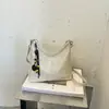 Nueva colección otoño/invierno 2026: Bolso de mano coreano simple, retro, moderno y versátil con un toque de alta gama, diseñado para mujeres, y se puede llevar como bandolera o bolso de hombro