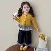 Conjunto Patchwork Xadrez Estilo Coreano para Meninas Primavera/Outono 2026 Nova Moda Infantil Conjunto de Duas Peças Estiloso Tendência