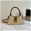 Bolsa de Mão de Alto Valor Feminina 2026 Outono Inicial Nova Bolsa de Ombro para o Trabalho Design Simples Moderno Nicho Bolsa de Ombro Único Transversal