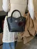 Bolsa de Mão Retro de Luxo para Mulheres 2026 Nova Primavera Versátil para o Dia a Dia Bolsa Transversal Exquisita Super Popular Bolsa de Ombro