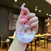 Chaveiro Estrela Rosa e Coelho da Lua Preenchido com Óleo, Chaveiro de Garrafa com Areia Líquida Estilosa Lua Pingente, Decoração para Mochila de Casal Venda por Atacado