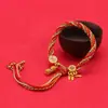 Pulsera de Cuerda para la Mano de Reencarnación de Xizang, Joyería Hecha a Mano con Herrajes Dorados Arena y Cuerda Roja para Hombres y Mujeres, Pulseras al por Mayor para Hombres y Mujeres