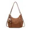 Bolsa Tote Retro de Grande Capacidade para Mulheres 2025 Novo Modelo Elegante de Ombro Único Transversal Multifuncional Mochila de Moda