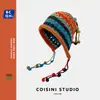 Gorro de diseñador de moda estilo coreano hecho a mano de ganchillo con pompón de colores para mujer, otoño e invierno, con cordones y borlas