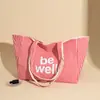 Bolsa de Lona Design de Nicho Positivo e Reverso Dupla Face Grande Capacidade para o Dia a Dia Bolsa de Ombro Estudante Feminina Estilo Coreano Listrada Bolsa Escolar