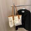 Bolsa grande de alta qualidade estampada feminina nova moda 2024 versátil bolsa de ombro estilo estrangeiro bolsa de compras para estudantes universitários