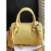 Bolso tipo almohada de moda 2026 Nuevo modelo de primavera, Bolso cruzado de un solo hombro único y elegante, Bolso popular casual texturizado para el hombro