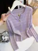 Suéter de punto calado con cuello en V de temperamento estilo pequeño Chanel para mujer, nuevo diseño de principios de otoño, ajuste ceñido, prenda exterior versátil, top rejuvenecedor
