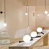 Lámpara de pared lineal estilo danés, pared de fondo de sala de estar nórdica, pasillo de escalera, lámpara de noche de dormitorio, hierro montado en pared LED de vidrio