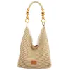 Bolso de mujer estilo casual 2026 nuevo verano súper popular tejido para vacaciones bandolera bolsa de mano para ir al trabajo de gran capacidad