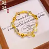 Pulsera elástica de cristal de imitación de lujo ligero de alta gama, versátil, con dijes de moneda irregulares, color dorado duradero que no se decolora