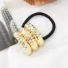 Estilo punk europeo y americano metal personalidad alta calidad cuerda para la cabeza semicírculo tubo redondo anillo para el pelo cuerda elástica para el pelo Balot fabricantes al por mayor
