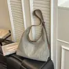 Bolsa tote grande transfronteiriça para o dia a dia de mulheres, nova bolsa de ombro tecida para o verão de 2026, bolsa transversal simples e versátil