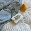 Bolso Pequeño Cuadrado con Lazo de Diseño de Nicho 2025 Otoño Nueva Moda Dulce Fresco Mini Bolso de Cadena para Labial Bolso Cruzado