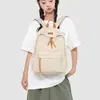 Mochila negra minimalista transfronteriza para estudiantes universitarias, bolsa ligera de gran capacidad para portátil, mochila elegante y mochila escolar