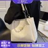 Bolsa grande de gran capacidad para mujer, nicho, nueva 2023, de alta calidad, versátil, portátil, para la escuela, para ir al trabajo, bolsa de hombro tipo tote