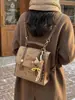 Moda de Comércio Exterior Bolsa de Couro Camurça para Mulheres 2026 Nova Versátil Casual Bolsa de Mão Mochila Simples Multiúso Bolsa Transversal