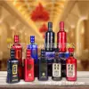 Botella de licor de 500 ml Yuncheng fabricante de botellas de vidrio a muestra hecha a medida Glaseado en spray flor horneada botella de vino hecha a medida botella de vino vacía hecha a medida