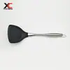 Venta al por mayor de fábrica Sartén antiadherente resistente a altas temperaturas Mango especial de acero inoxidable Espátula Juego de utensilios de cocina de silicona Pala para cocinar en la cocina