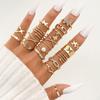 Venta caliente transfronteriza, anillo de mariposa en espiral con diamantes de estilo lujoso y ligero, conjunto de 18 piezas, combinación de anillos de metal de moda.