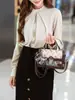 Bolso cruzado de un solo hombro moderno y elegante para mujer 2026 Modelo Nuevo Moda para ir al trabajo Retro Alta Gama Ligero Bolso de mano casual