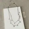 Collar de Doble Capa con Borla de Estrella Starburst para Mujer, Lujo Accesible Diseño de Nicho, Único Elegante, Cadena de Cuello de Moda, Cadena para Clavícula