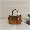 Bolsa Exclusiva Shuai Mijia Estampa de Leopardo de Nicho Nova Moda Outono 2026 Bolsa Transversal Feminina Pequena de Mão Tote