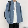 Estilo Harajuku Camisa de mezclilla manga larga estilo Hong Kong casual holgada camisa de otoño moda masculina abrigo