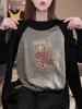 Elegante camiseta de manga larga para mujer, con bloques de color, manga raglán y algodón 100%, un básico versátil para el otoño