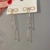 Celebridad de Internet Moda Pendientes de Borla de Circonita Incrustados de Diamante Celebridad Femenina Diseño de Nicho Sencillo Joker Elegante Pendientes Elegantes Venta al por Mayor