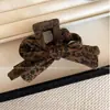 Pinza para el Cabello con Estampado de Leopardo Retro para Mujer 2025 Nuevo Clip de Flequillo de Gama Alta Clip para Cabello Suelto Clip de Cabello Elegante Versátil Otoño e Invierno Accesorios para el Cabello