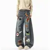 Marca Americana Tendência de Verão Bordado de Desenho Animado Americano Toalha Jeans Denim Calças de Pierna Larga de Designer Masculinas Largas Versáteis Calças de Comprimento Total