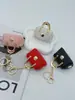 Colgante Llavero Mini Bolso de Cuero, Accesorio de Moda de Alta Gama para Bolso, Accesorio Creativo para Niñas, Puede Guardar Auriculares